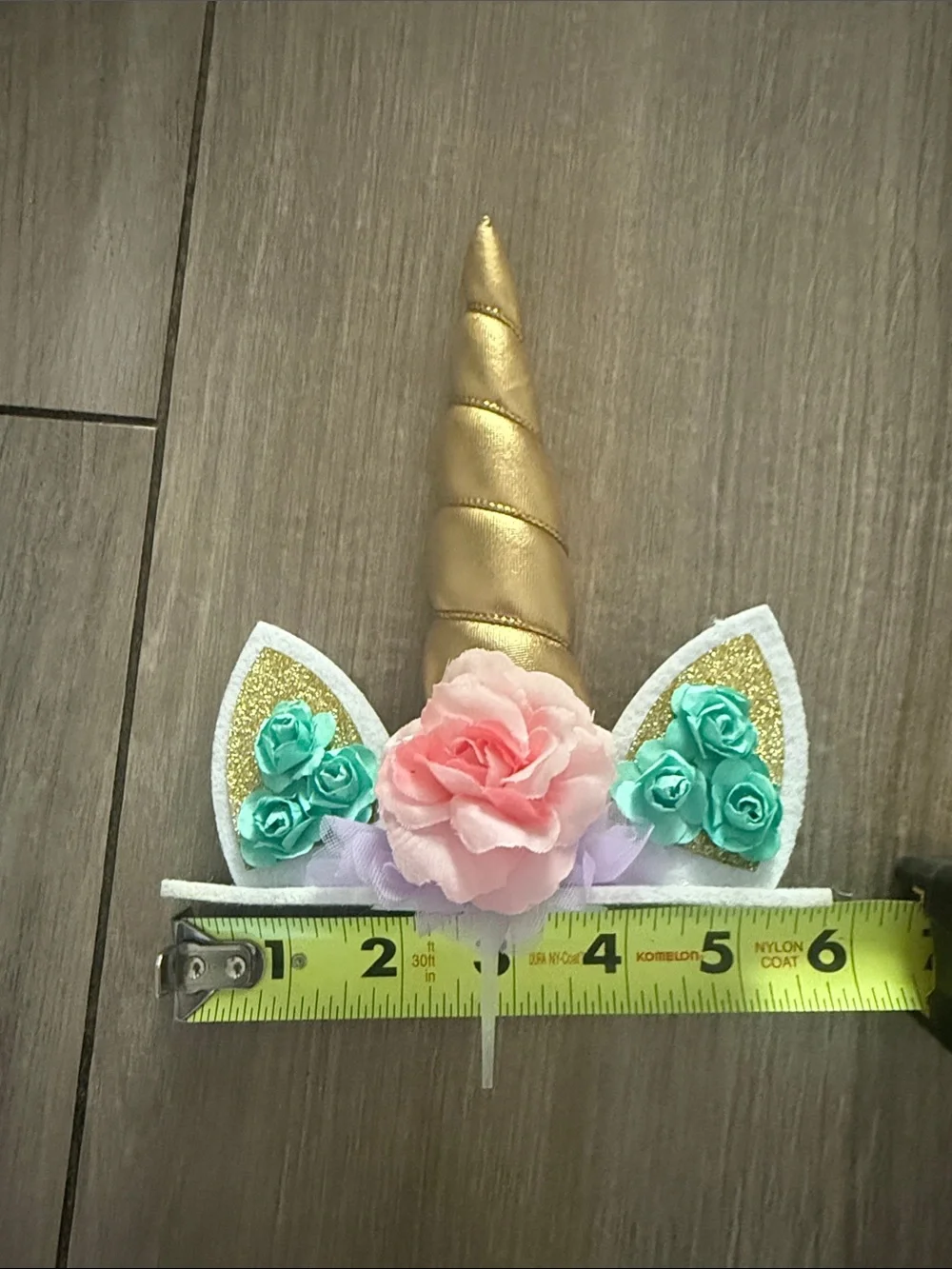 Gold Unicorn Horn Cake Topper with Pink and Teal Flowers